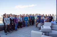 The attendees of the TACO 2023 conference on the terrace of TUtheSky - one of the best views over the city!