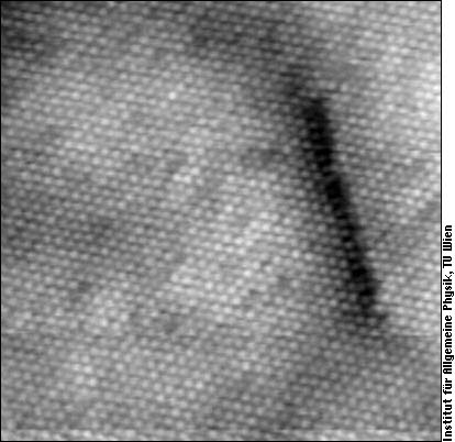 STM image of partial dislocations spanning a stacking fault